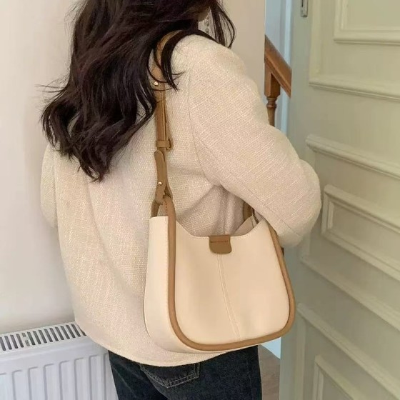 Niche quality underarm bag for women, new autumn/winter style, sophisticated Korean-inspired saddle bag, versatile shoulder/crossbody bag.
